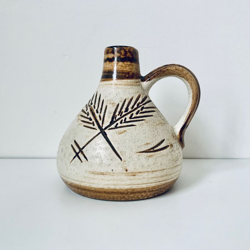 Ceramic and Earthenware Vessels Hold Fresh Blooms