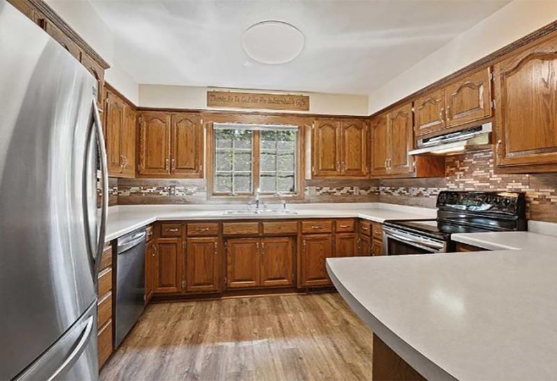 Oak Cabinets with Cathedral Arches