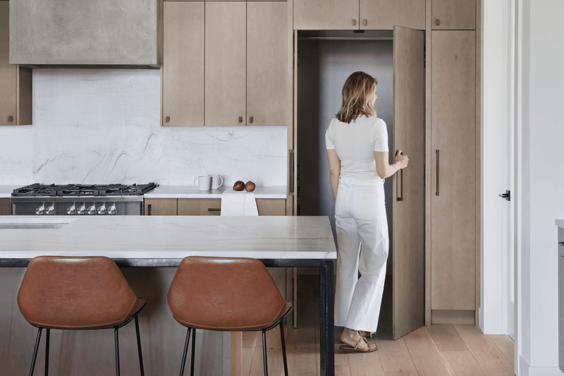 Concealing pantries behind matching cabinet fronts