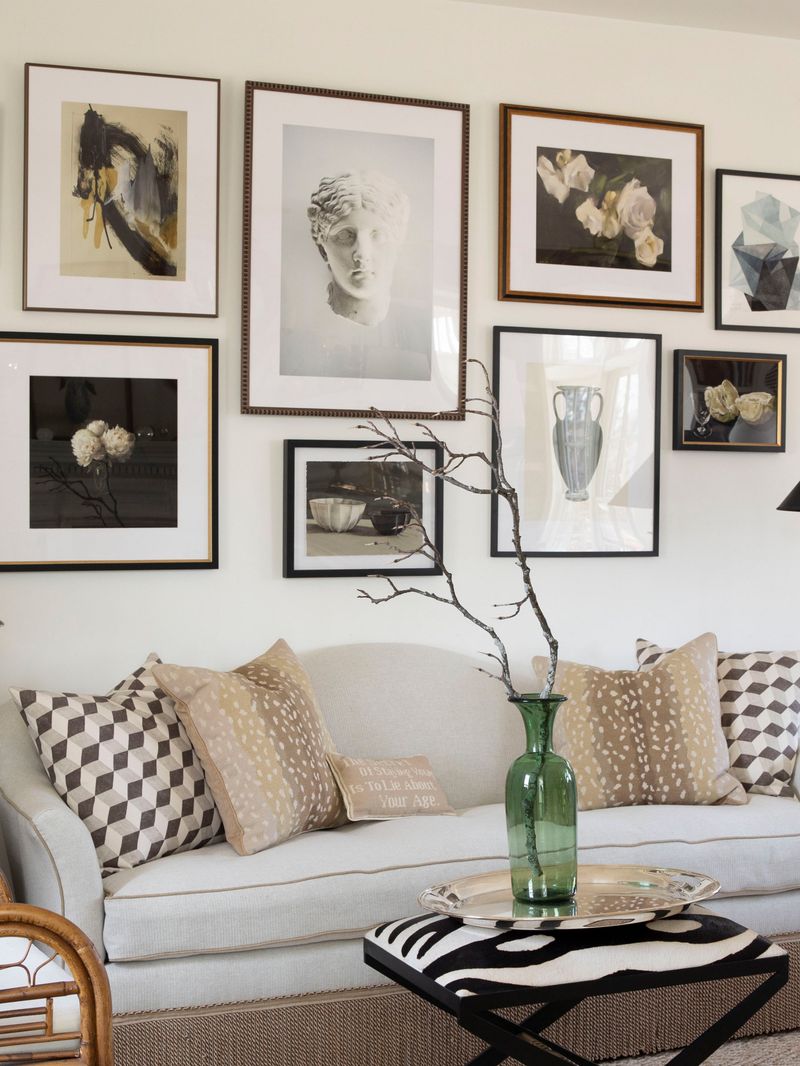 Layered gallery walls that tell a personal story over years