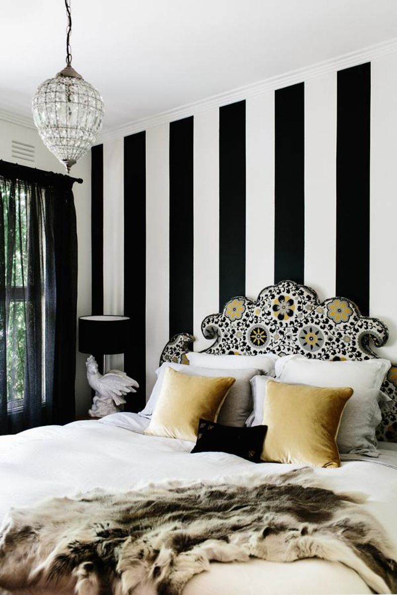 Striped Accent Wall Behind The Bed