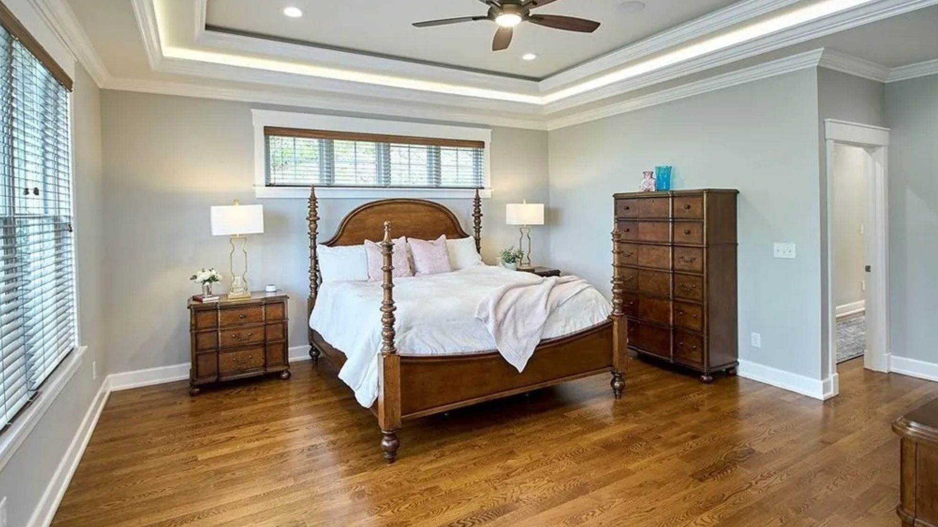master bedroom with wooden bed