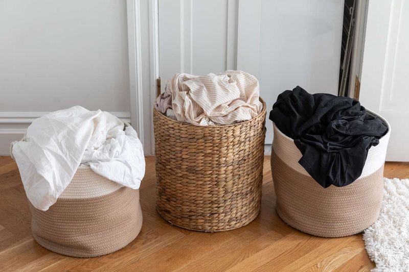 Laundry Hamper Overflowing With Clothes