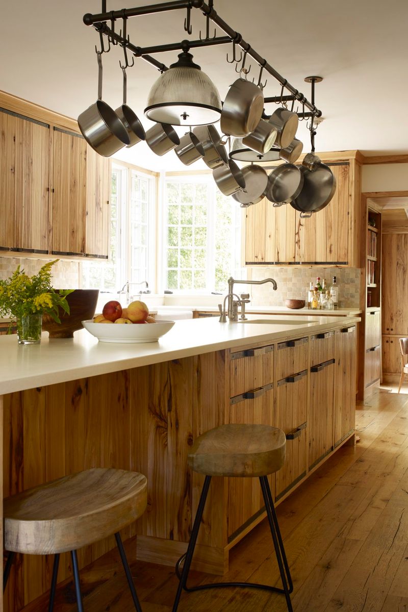 Pot racks hanging from the ceiling
