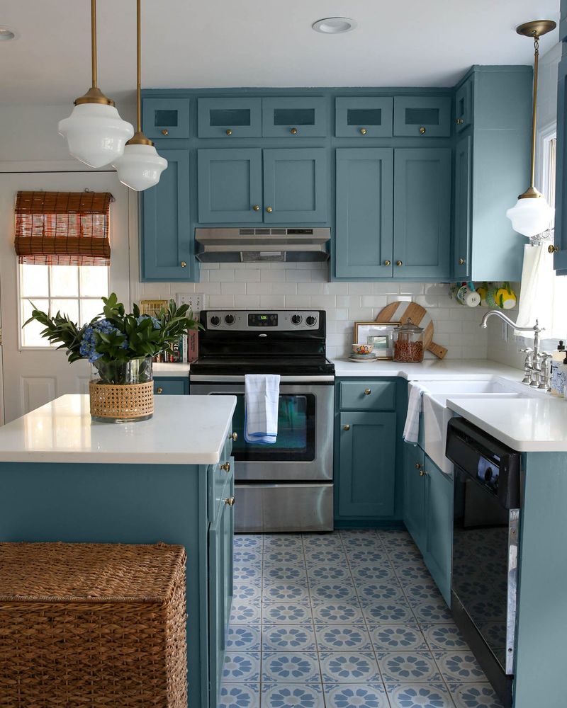 Paint cabinetry in faded denim blue for rustic charm