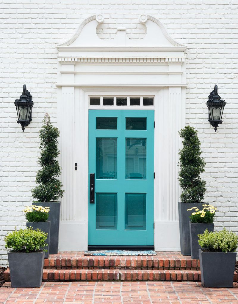 Bright Turquoise Door + Charcoal Shutters