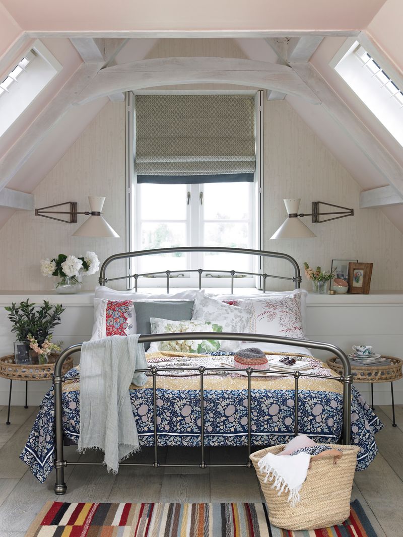 Attic Bedroom With Sloped Ceilings