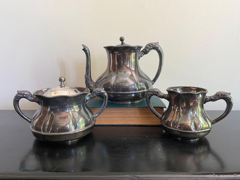 Tarnished Silver Tea Set With Bent Spoons