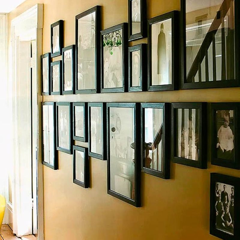 Hang Lots Of Framed Family Photos On The Walls
