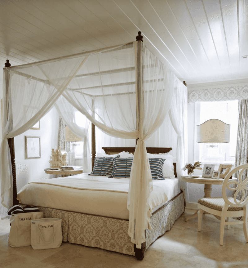 Hang Thick Curtains Around Your Bed