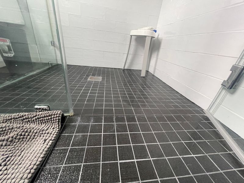 Installing Zero-Threshold Showers That Flood Bathroom Floors