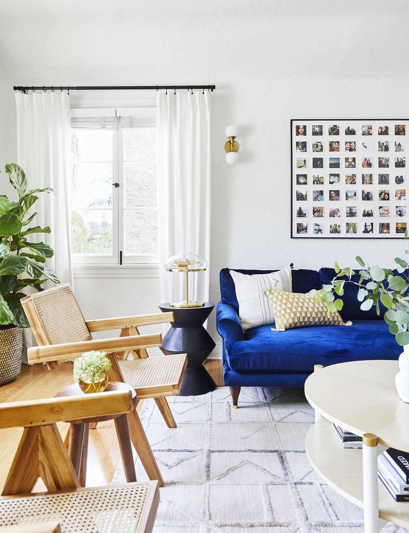 Cobalt Blue Sofa With Black And White Photography