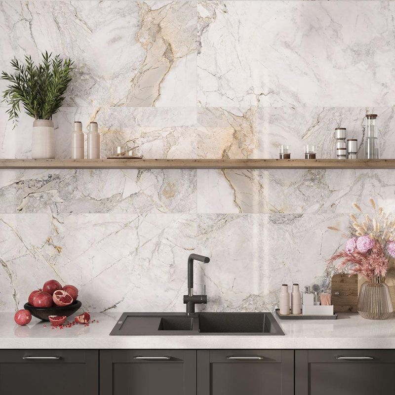 Replace with: Large-format slab or zellige tile backsplashes