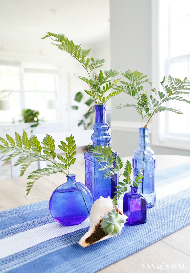 Fresh-Cut Greenery in Simple Vases