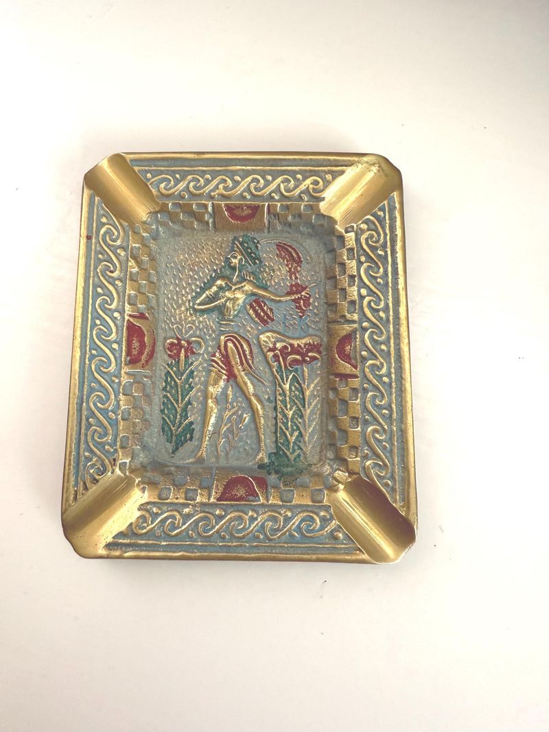 Chipped souvenir ashtrays