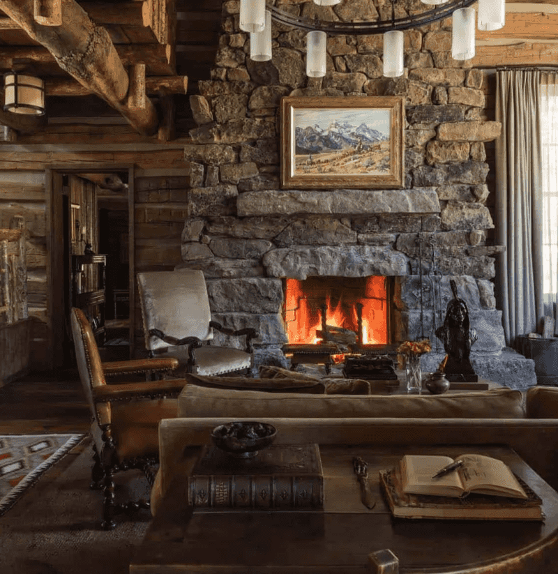 Cottage Living Room With Stone Fireplace