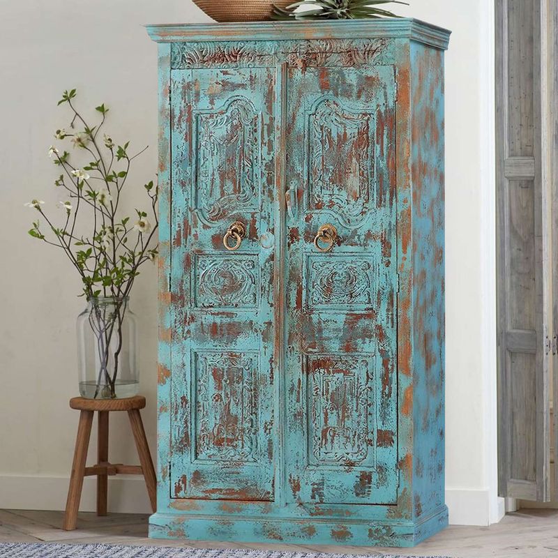 Restored antique armoires that became statement storage