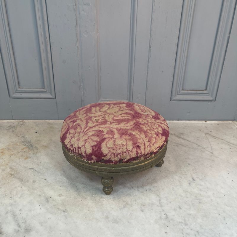 Faded needlepoint footstools