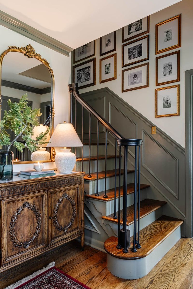 Along the staircase wall under the railing