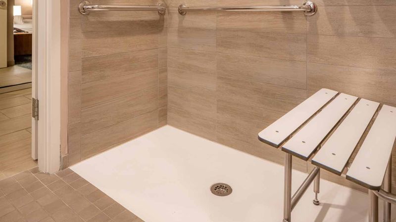 Ripping Out Beautiful Bathtubs For Boring Roll-In Showers
