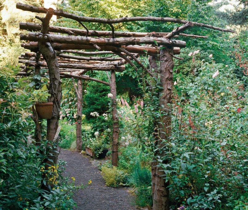 Rustic reclaimed wood pergola-style arbor