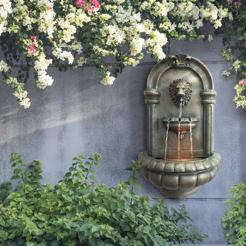 Lion head wall fountains