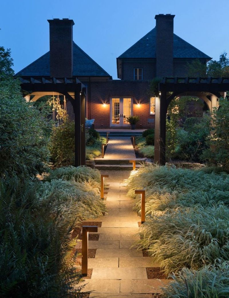Pathway with built-in lighting and planter boxes