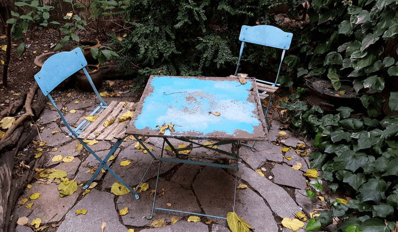 Outdated Iron Furniture with Peeling Paint
