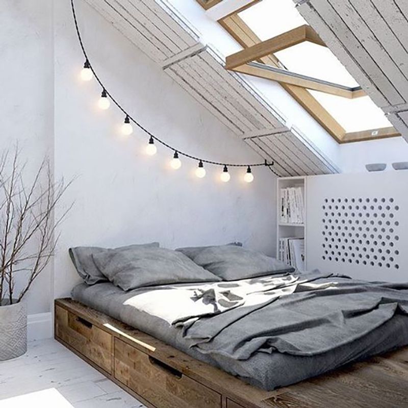Install String Lights Along The Angled Ceiling