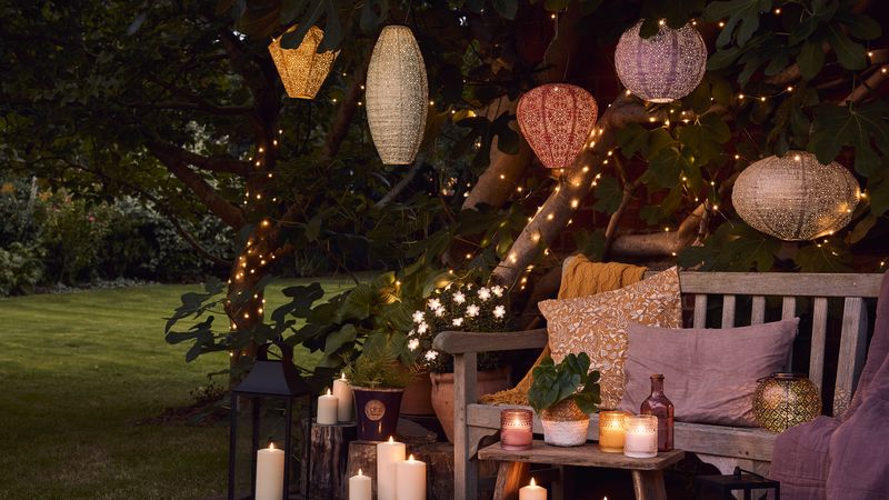 Use Lanterns or Candles for a Romantic Glow
