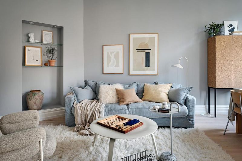Ice Blue Sofa With Marble Coffee Table