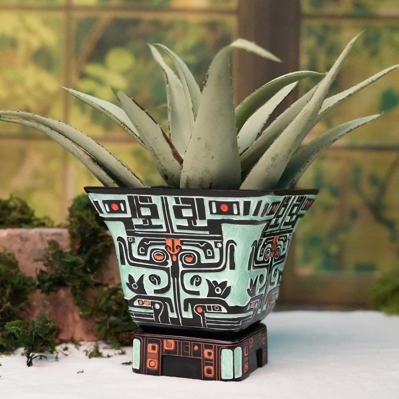Hand-Painted Geometric Pottery