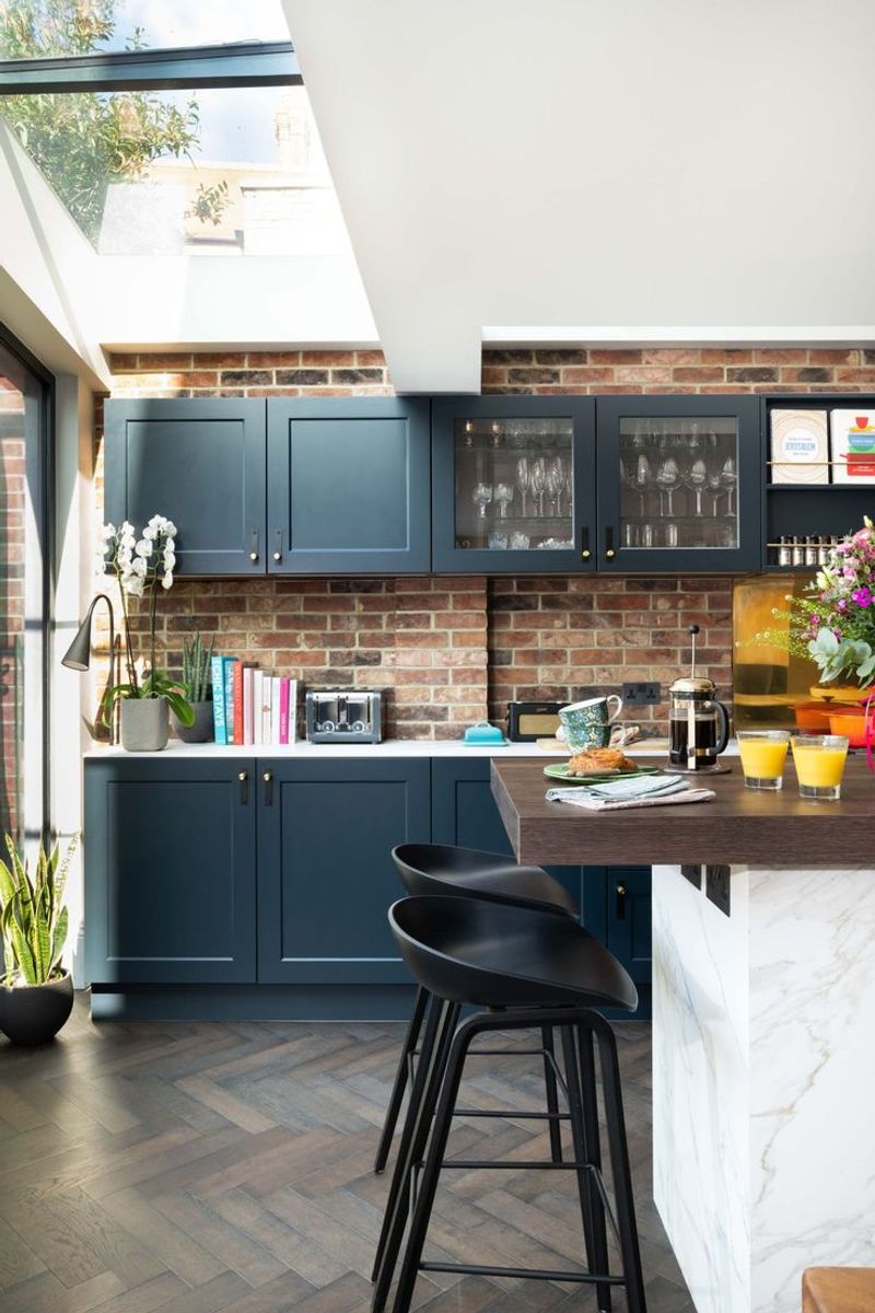 Thin Brick Backsplash with Cobalt Blue Cabinets