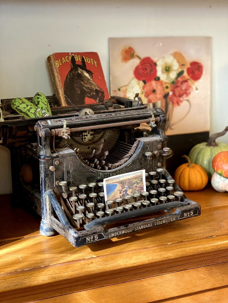 Vintage Typewriters As Bookshelf Showpieces