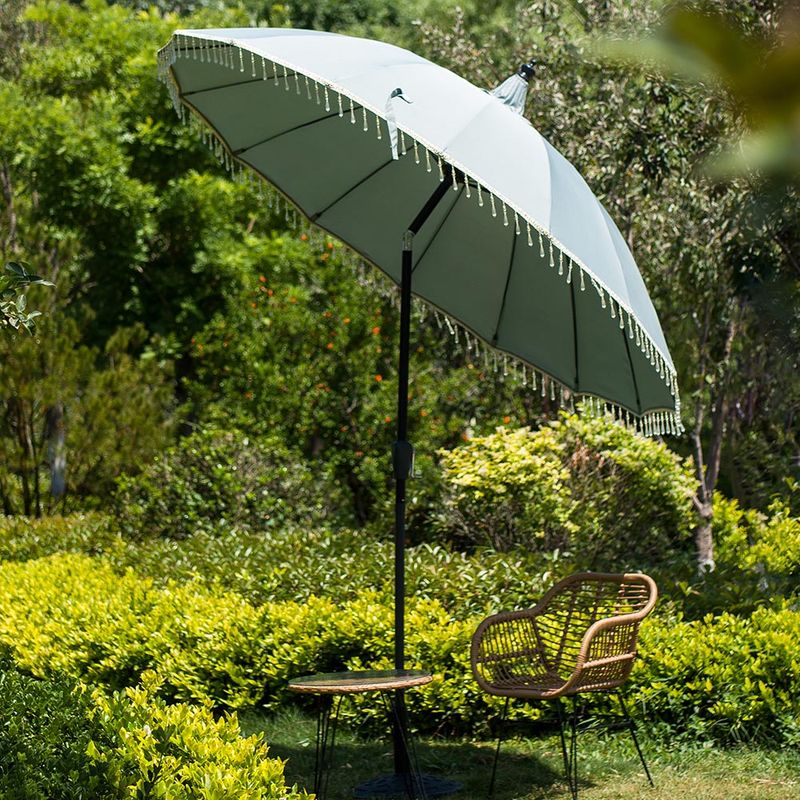 Torn Garden Umbrellas With Bent Ribs