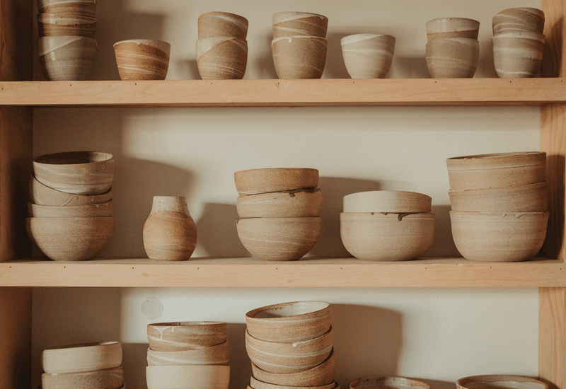 Open shelving with adobe or clay pots