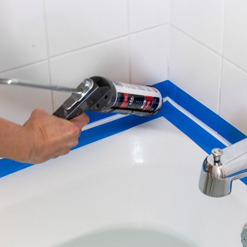 Worn caulk in the bathroom