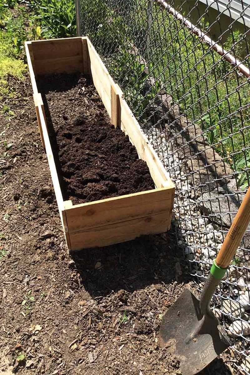 Build Raised Garden Beds Against The Fence