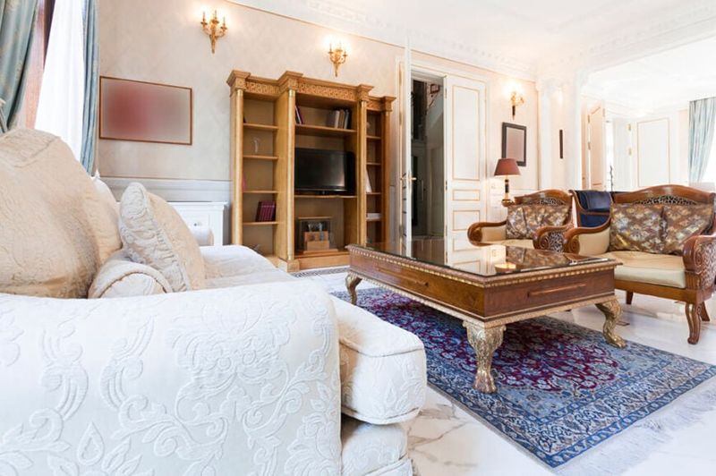 Overly ornate antique cabinets