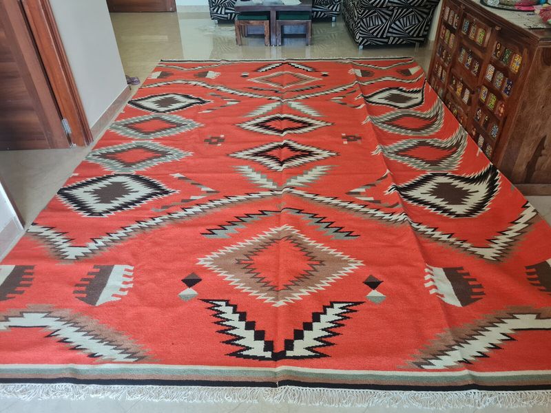 Woven wool rugs with geometric patterns