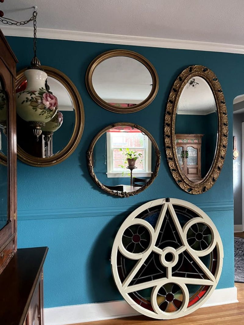 Incorporate mirrors or objects alongside art