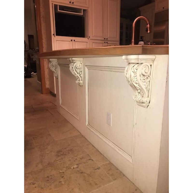 Ornate Corbels And Excessive Molding