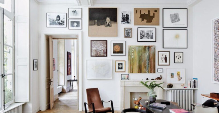 17 Designer-Approved Ways To Style Wall Art In Your Living Room