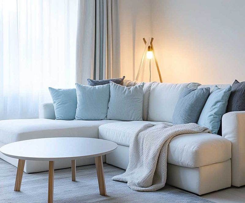 Choose Light-Colored Furniture to Reflect Light