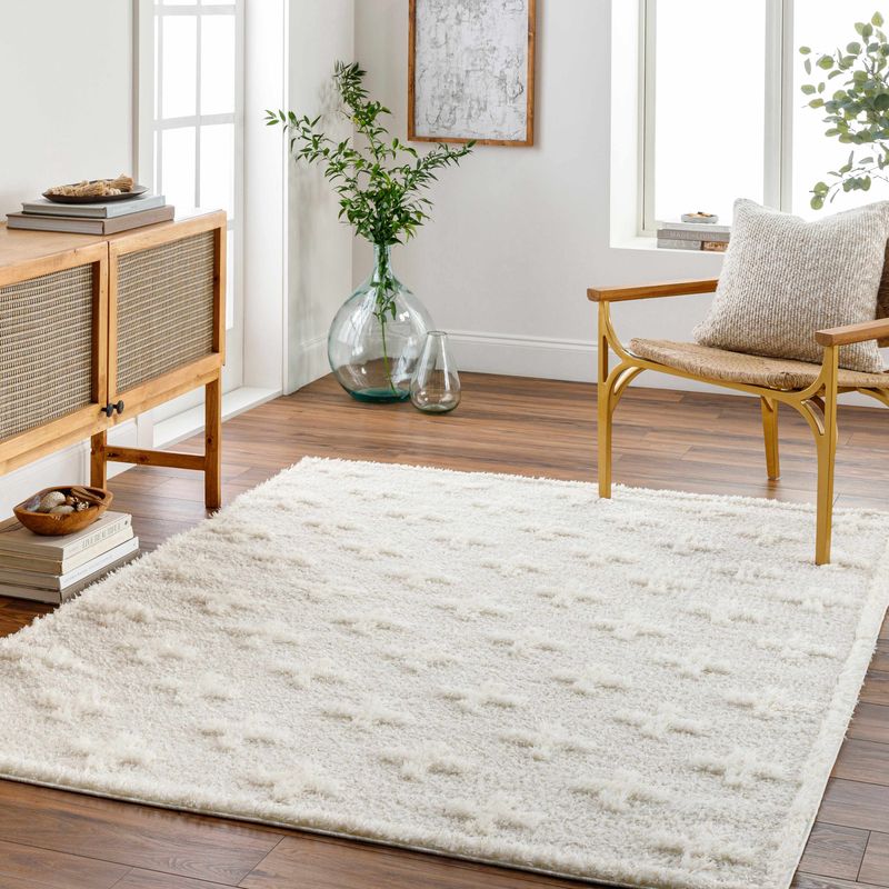 Use Cream Rugs to Ground the Space