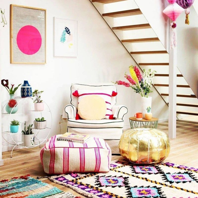 Use vibrant cushions and poufs