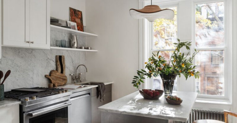 Behind The Design Of A Narrow NYC Apartment That Fits A Breakfast Banquette And A Big Sofa