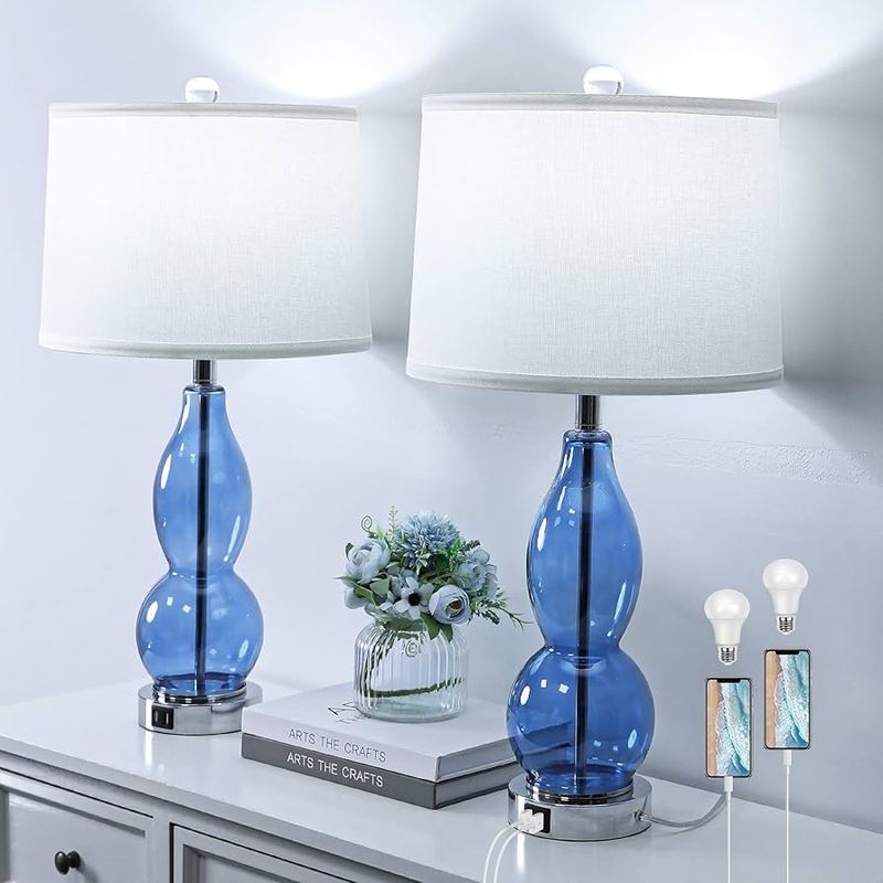 White Nightstands with Blue Lamps