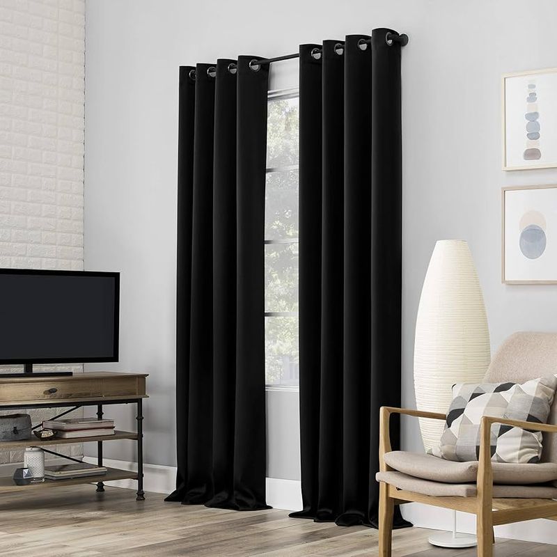Use blackout curtains to reduce glare
