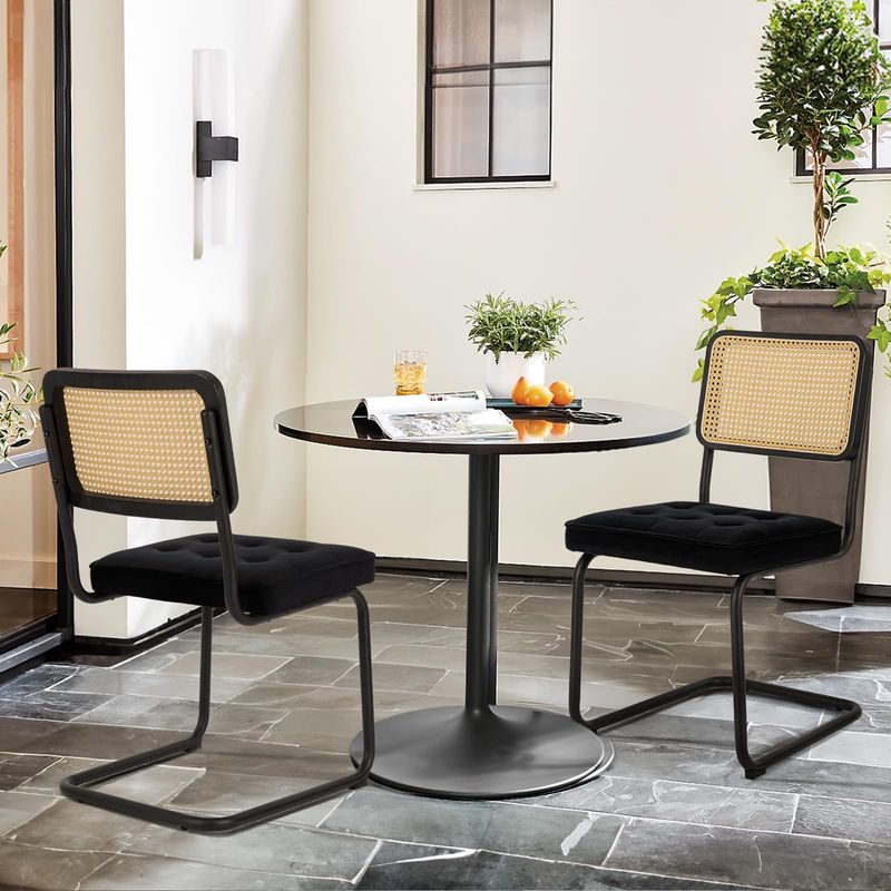 Windsor Chairs at a Table with Chrome Cantilevers